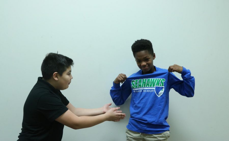 Sixth graders Milton Okazaki Lopez and Kavon Price argue about dress code. The dress code has been changed multiple years in a row. 
