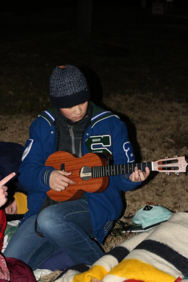 Senior Addie Bay plays the ukulele during Sleep Outside. Bay said her favorite part about Sleep Outside was hearing loud snoring coming from an anonymous source on the couch in Ms. Meyers room