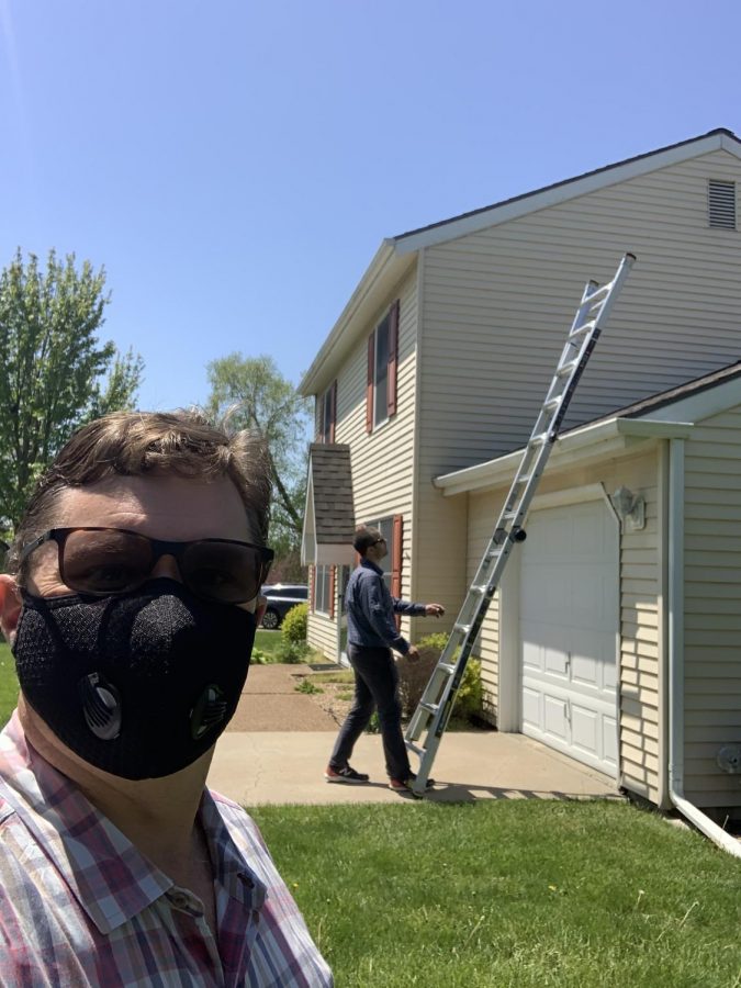 Bryan Hedges takes a selfie with a house inspector. Hedges real estate business has adapted quickly to the COVID-19 pandemic. 