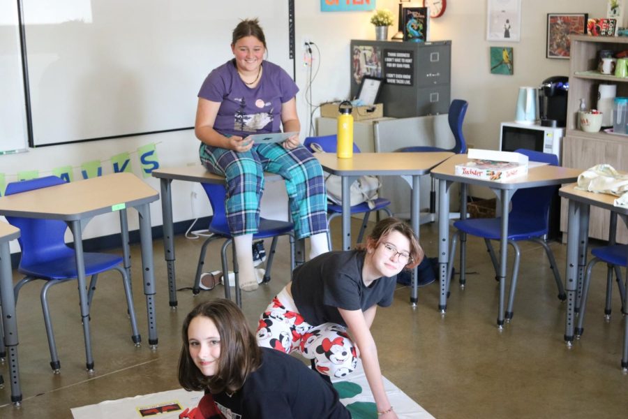 Eighth graders Lillian Meier, Hayden Koch and Bridgette Stucky-Dorris play a riveting game of Twister. Faculty member Vanessa Eicher’s classroom is a popular Open Hour hangout.
