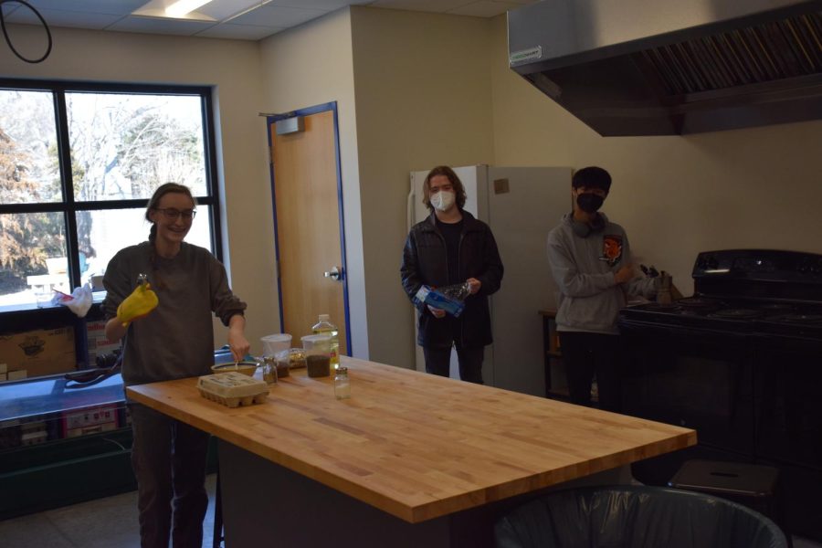 Freshmen Katherine Eudaly, Tristan Wentling and Evan Tangpornsin cook with the schools recently purchased kitchen items. Madame Buckners French I class put the new supplies to test by making crepes at the beginning of the month.