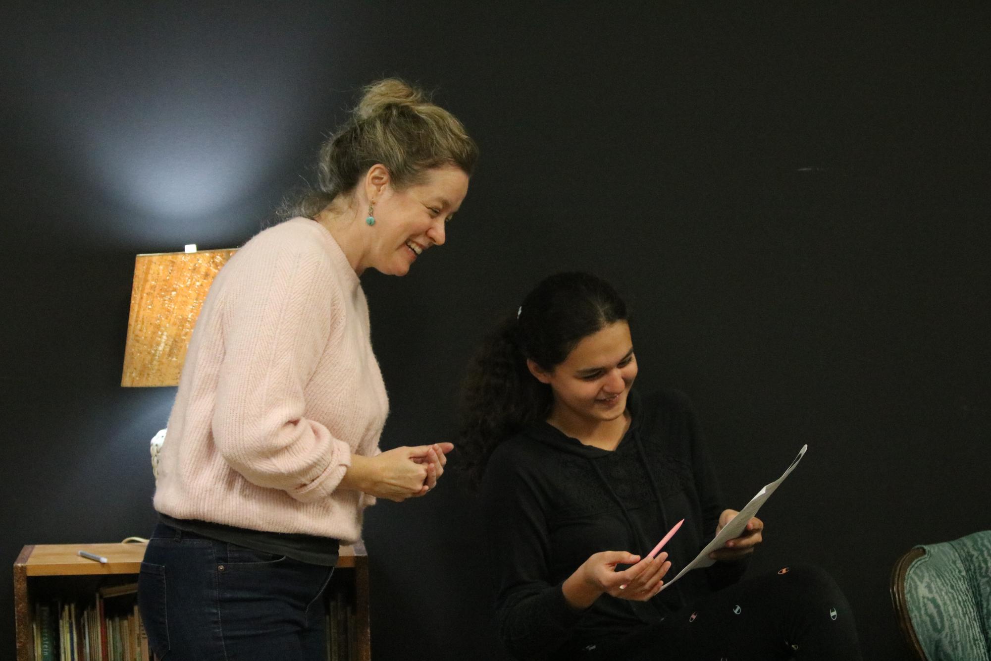 Faculty member Elizabeth Sullivan goes over lines with her theatre student seventh grader Sophia Olson-Kelly Ramirez. This fall, Sullivan successfully directed “The Rose and the Rime,” one of Seabury’s most unique plays in recent history.